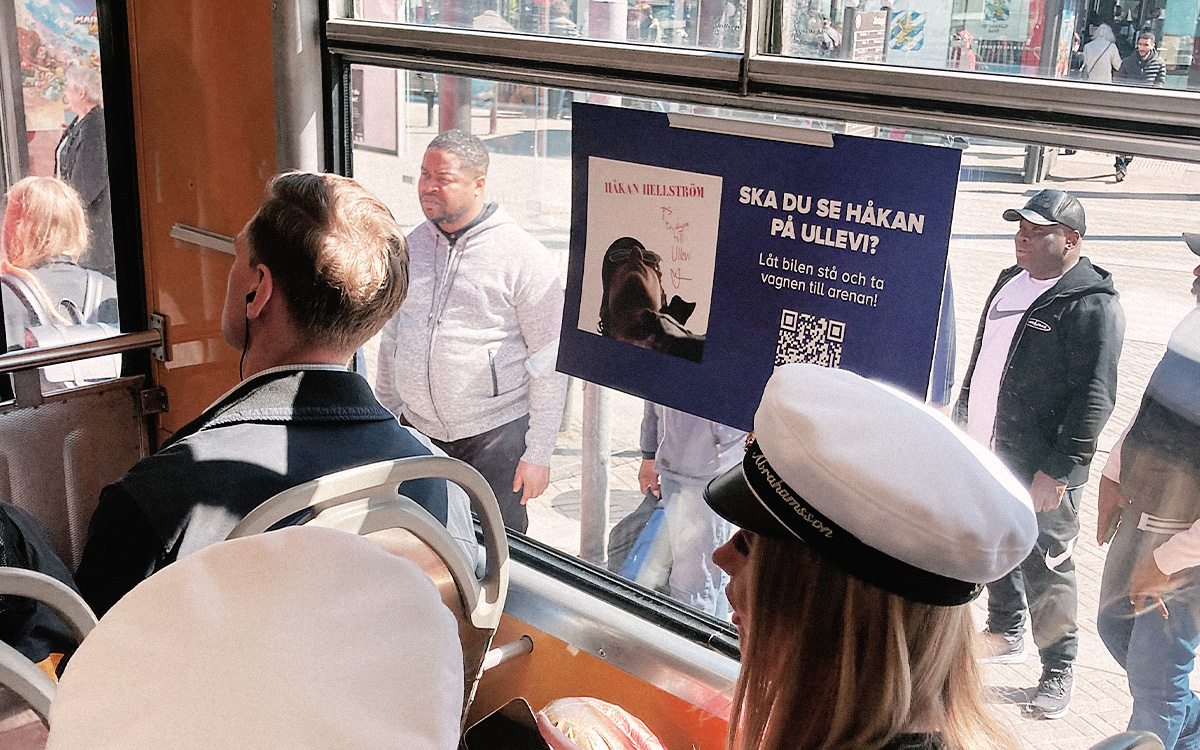 A tram in Gothenburg filled with people commuting.
